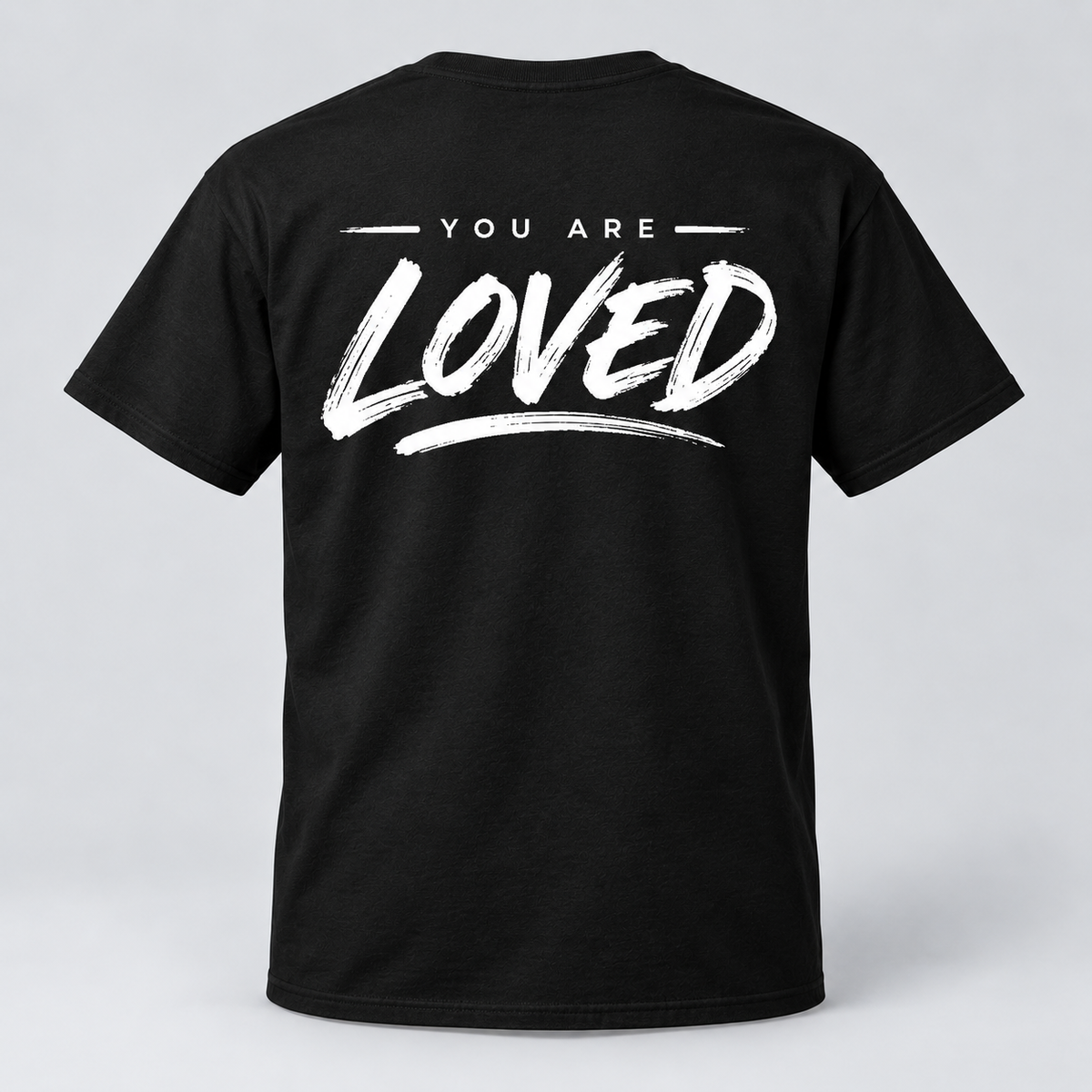 Back of black Church of Exiles T-shirt with white You Are Loved graphic