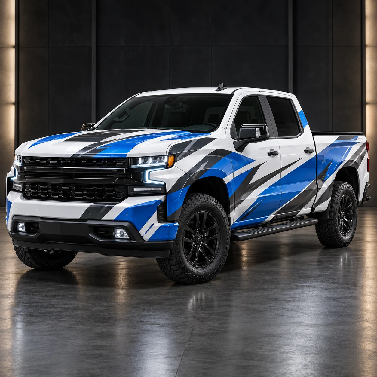 Vehicle wrap concept with blue and charcoal graphics